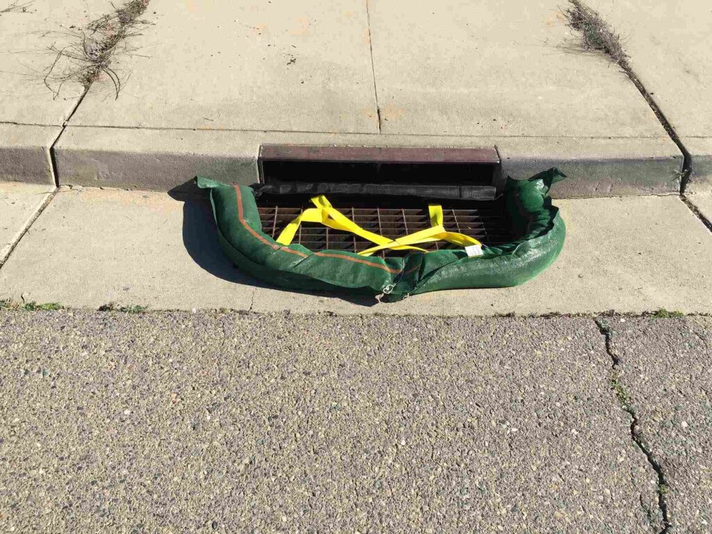 An green-colored snake bag used for inlet protection.